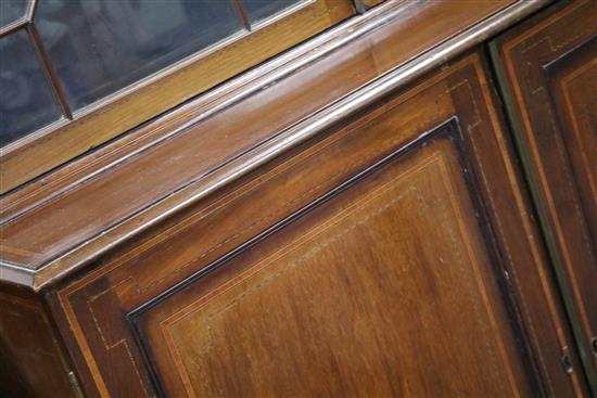 An Edwardian inlaid mahogany bookcase W.125cm